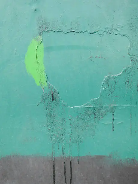 Photo of couleur locale, iron door of a garage painted in green