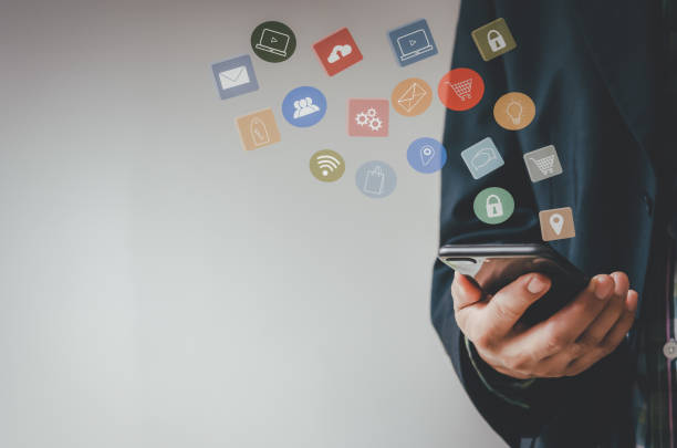 istock Man using phone payment shopping online and network connection icon on hologram virtual screen.Digital marketing sales ideas online. 1332277881