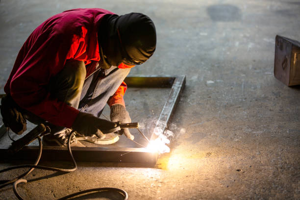 istock Workers Are Welding A Steel Frame. 1332279780