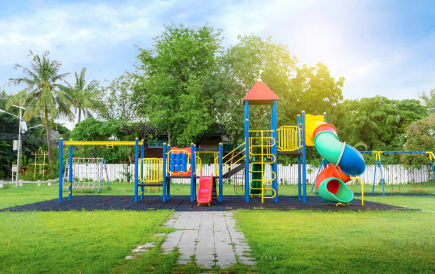 istock Colorful playground on yard in the park. 1332281355