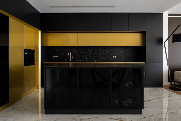 istock Luxury kitchen in black and gold 1332286790