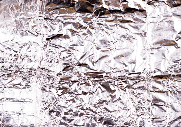 istock Texture of aluminum foil close-up. Background 1332291374