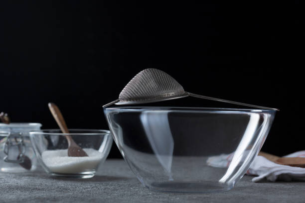 istock Empty transparent bowl and dishes on the kitchen table 1332291595