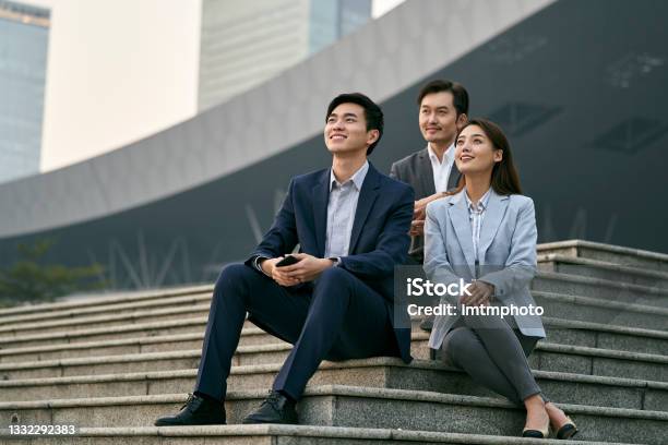 Asian Business People Relaxing Outdoors Stock Photo - Download Image Now - Asia, Shenzhen, Asian and Indian Ethnicities