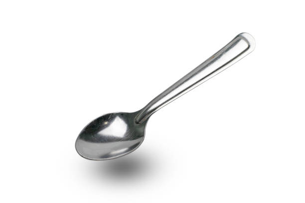 istock Silver spoon photo stacking isolated on white background with clipping path. 1332298474