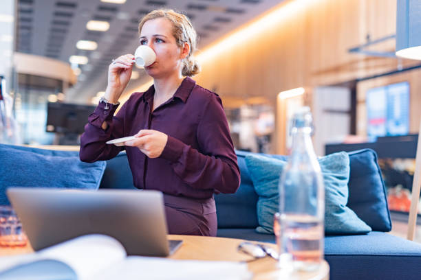 istock Young businesswoman having a coffee break 1332299916