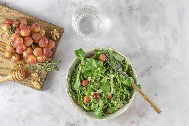 istock Roasted grapes, pecorino, walnut, and arugula salad. 1332313932