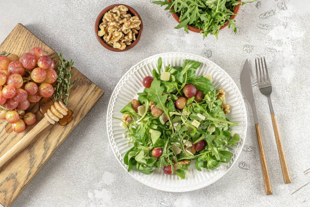 istock Roasted grapes, pecorino, walnut, and arugula salad. 1332314277