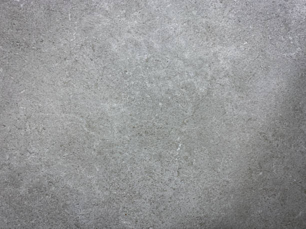 istock Gray concrete texture with scratches natural stone background. 1332314391