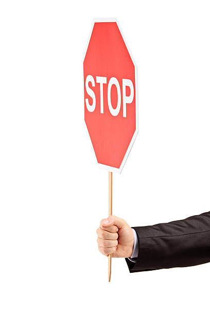 istock Hand holding a traffic sign stop 133231442