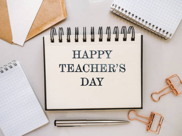 istock Happy Teacher's Day. Notepad with a congratulatory inscription 1332315467