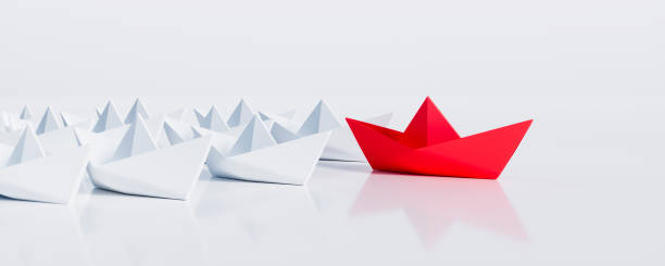 istock Paper boats - Thinking concept differently - Changing course - new ideas 1332317902
