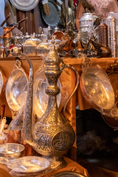 istock gaziantep province, coppersmiths bazaar. various copper crafts. close-up. colored cups and similar products. 1332318528
