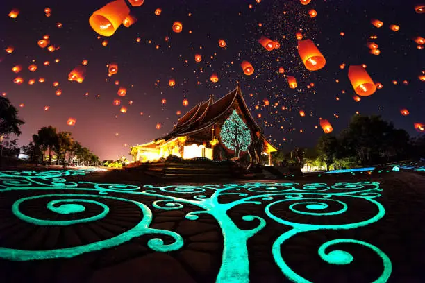 Photo of Beautiful night of Glowing tree at Wat Sirintornwararam, Wat Phu Prao the temple in Ubon Ratchathani Province, Thailand
