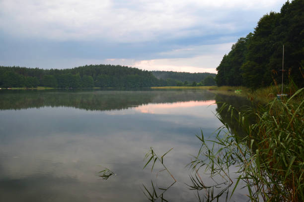 istock calm lake during the sundown 1332321907