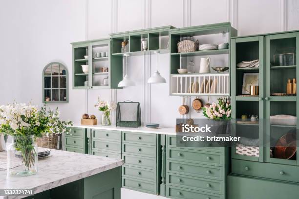 New Stylish White Kitchen With Green Furniture Stock Photo - Download Image Now - Kitchen, Green Color, Cabinet