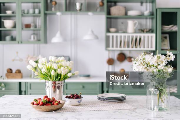 Kitchen Countertop With Flowers In Bucket And Jar Stock Photo - Download Image Now - Home Interior, Springtime, Kitchen