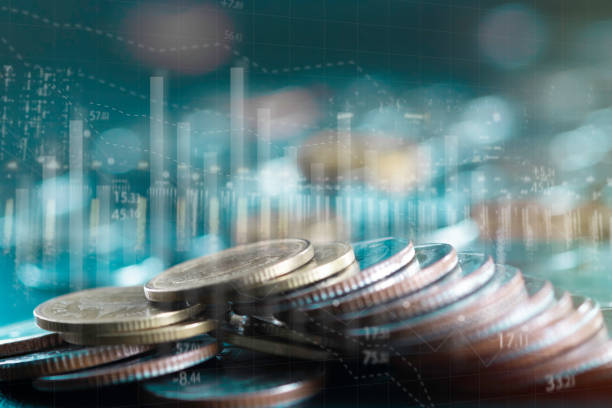 istock Double exposure of stack rows money coin with trading graph chart stock market. 1332327085
