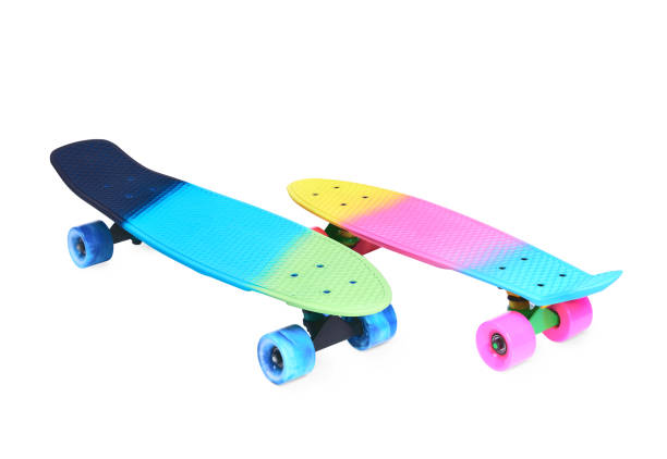 istock Two rainbow plastic Penny board skateboards on white background 1332328206