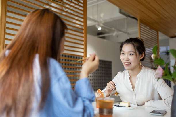 istock woman drinking afternoon tea in coffee shop 1332330432