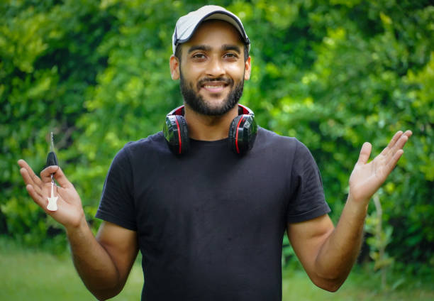 istock happy man with headphone and scotty 1332330528