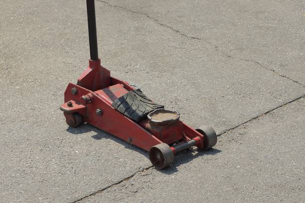 istock one red compact mechanical iron forklift with small black wheels 1332332716