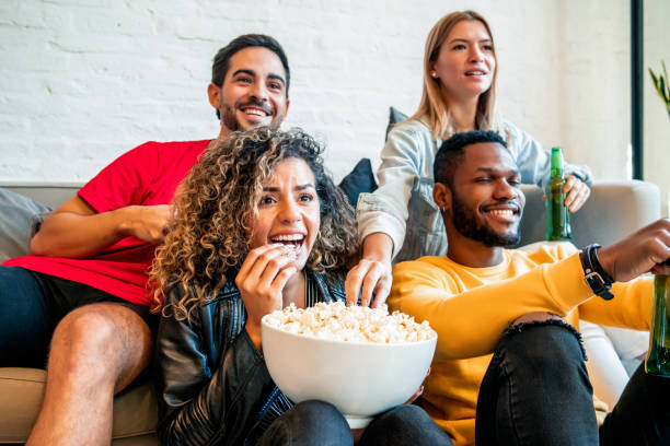 istock Friends having good time while watching a match together. 1332338404