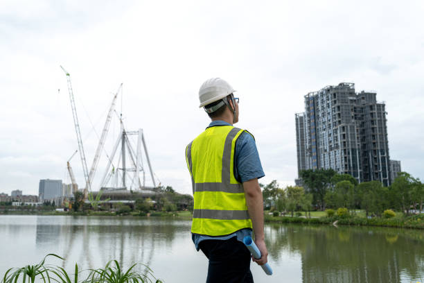 istock Male engineer at a construction site by the water 1332339375