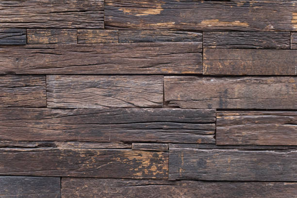 Pattern of wooden texture, Vintage dark brown color wooden stripe background. Rustic wood boards and background