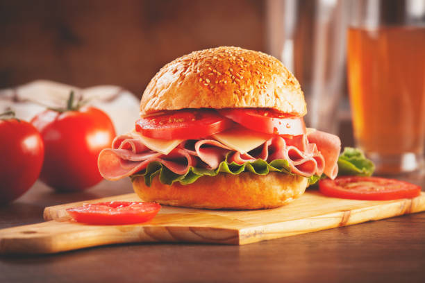 istock Sandwich with smoked ham and fresh lettuce 1332340516