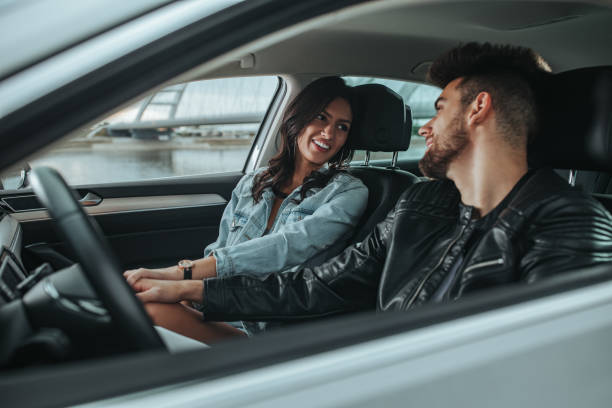 istock An affectionate young couple enjoying a road-trip 1332343325