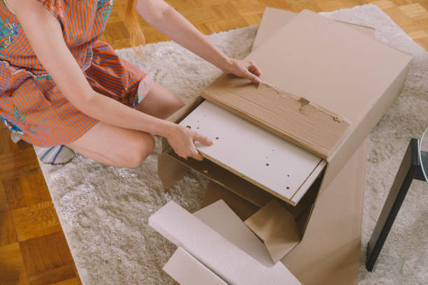 istock Unboxing new flat packed furniture 1332346961