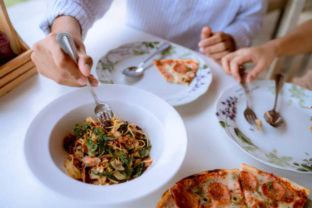 istock Gourmet couple having pizza for lunch together. 1332347267