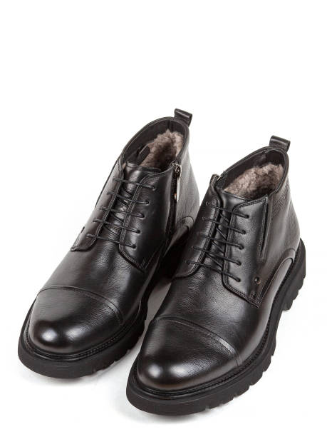 istock Classsic new men's black winter leather fur boots isolated on white background 1332355755