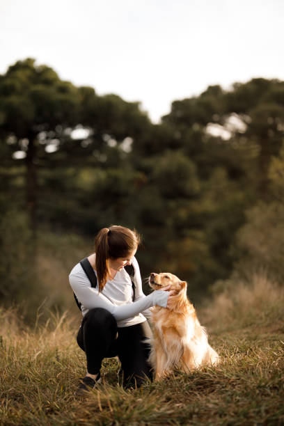 istock Pet owner showing affection to her dog 1332356279