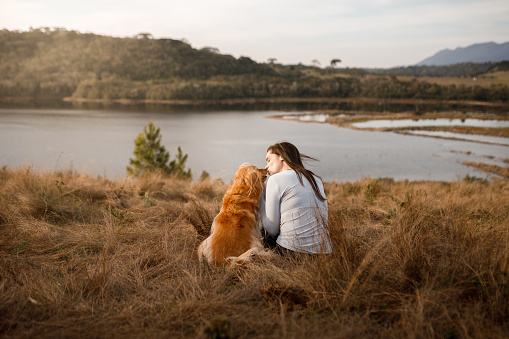 Pet owner showing affection to her dog