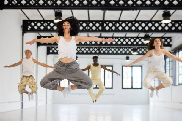 istock Group of dancers training in ball room 1332358397