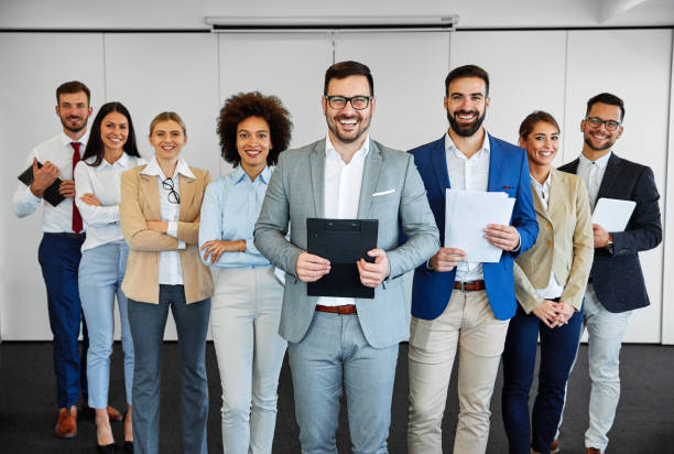 istock successful business team smiling teamwork corporate office colleague 1332358738