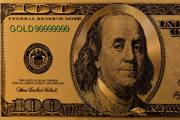 istock golden 100 US dollar banknote 1332358930