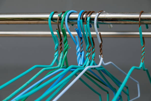 istock The old hanger group is arranged on the stainless steel bar. 1332361122