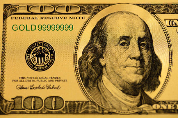 istock golden 100 US dollar banknote 1332361870