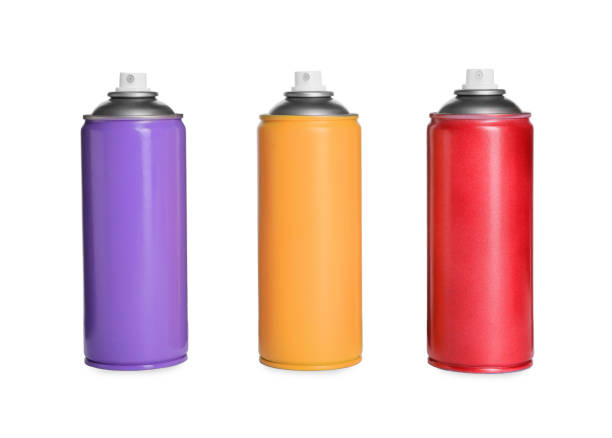 istock Cans of different spray paints on white background. Graffiti supplies 1332364176