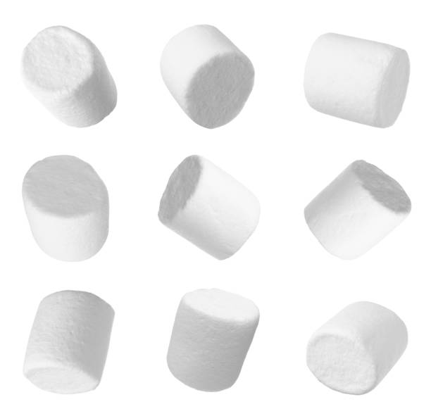 istock Set with delicious sweet puffy marshmallows on white background 1332364224