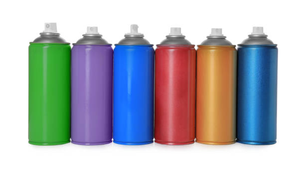 istock Cans of different spray paints on white background. Graffiti supplies 1332364239