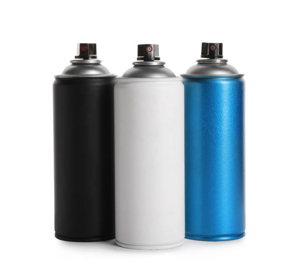 istock Cans of different spray paints on white background. Graffiti supplies 1332364257