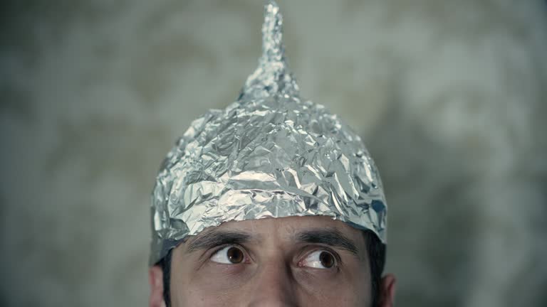 Man wearing tin foil hat