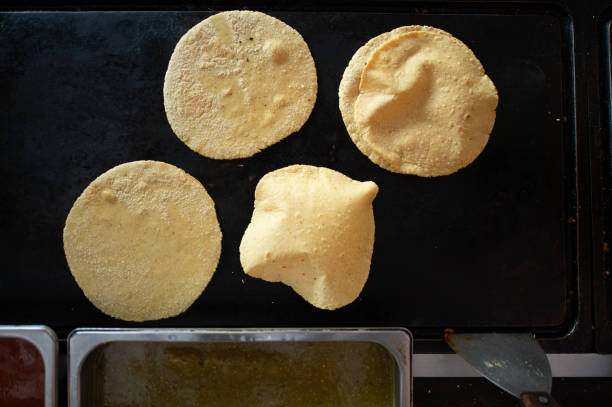 istock Mexican corn tortilla cooking on a grill 1332367396