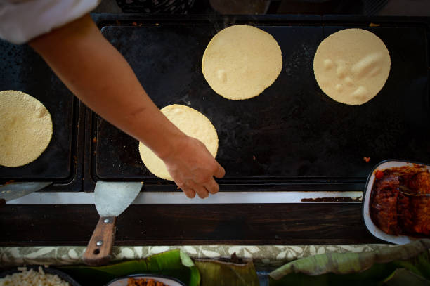 istock A chef coocking corn tortillas on a grill 1332367420