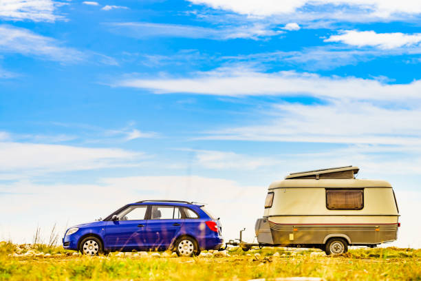 Caravan trailer camping on seashore. Capicorb, Valencia region Spain. Vacation with mobile home.