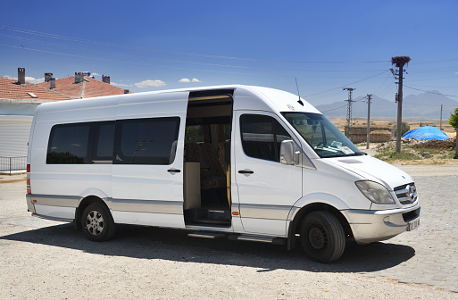 Cappadocia, Turkey 12.07.2021:White passenger Mercedes-Benz Sprinter in Turkey. This model is the most popular minibus in Europe